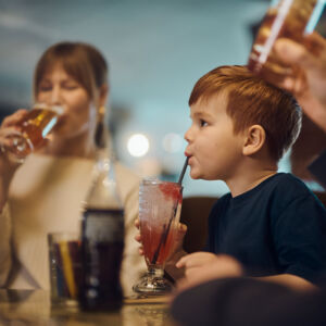 Kids with family having dinner at Coner.