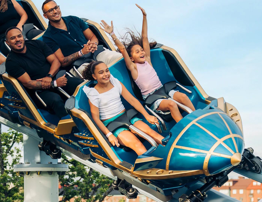 Children riding a roller coaster at Liseberg in Gothenburg