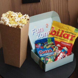 Funbox with popcorn and snacks in a colorful package.