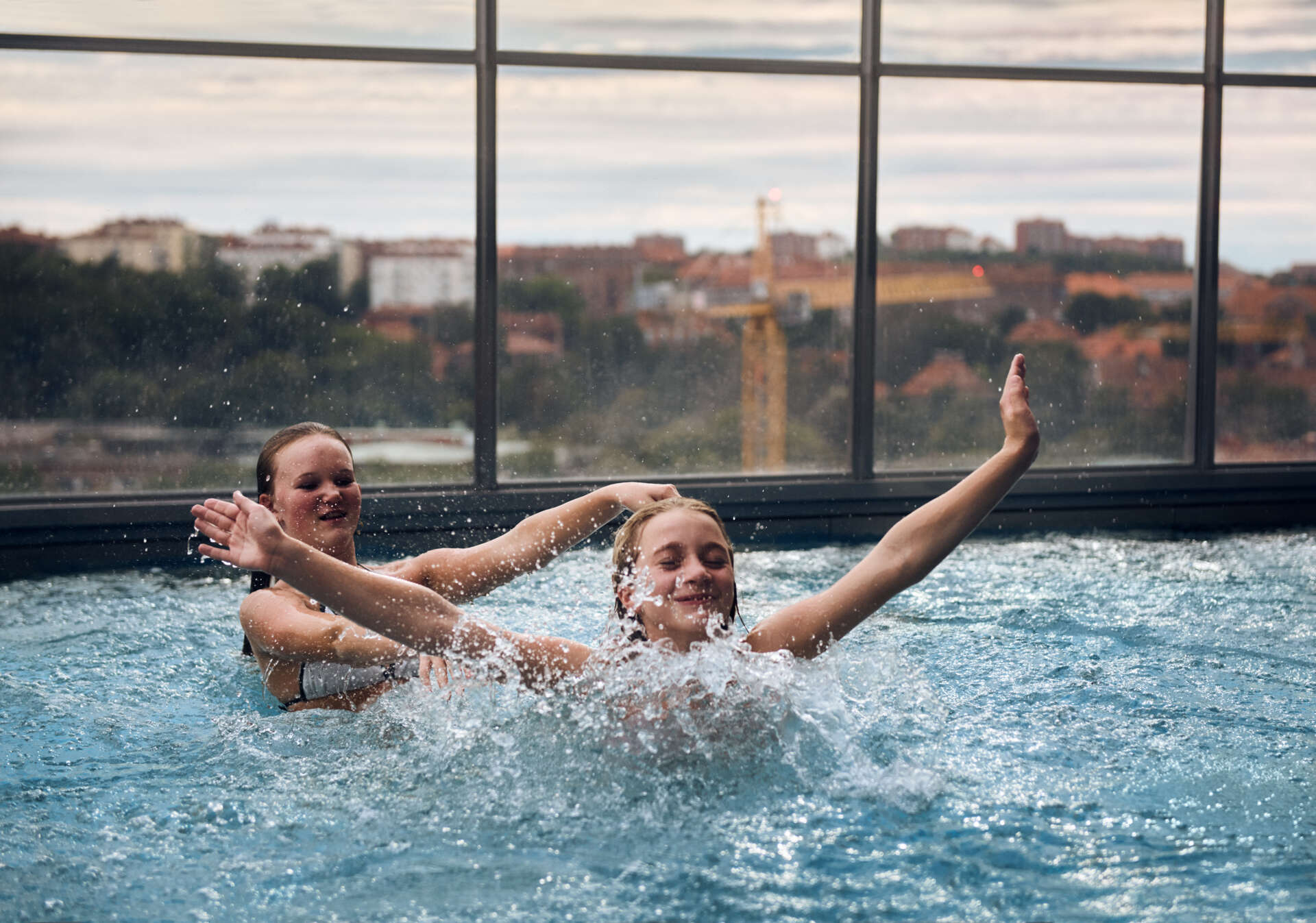 Kids swimming and playing in Upper House Spa Pool